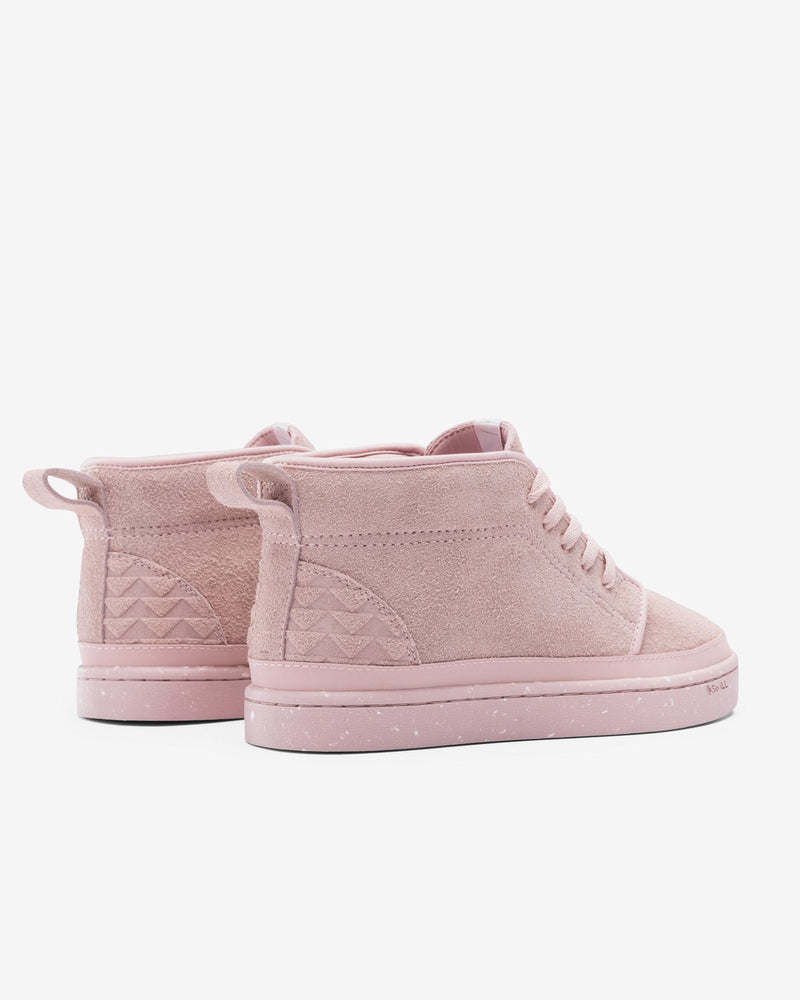 Dirty Pink Chukkas displayed in a pair on a white background. Shown from the back at an angle, highlighting the heel construction and Jason Momoa's triangle tattoo pattern.