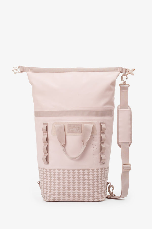 on the roam and so ill collaboration by jason momoa 25L medium pink bag on grey background