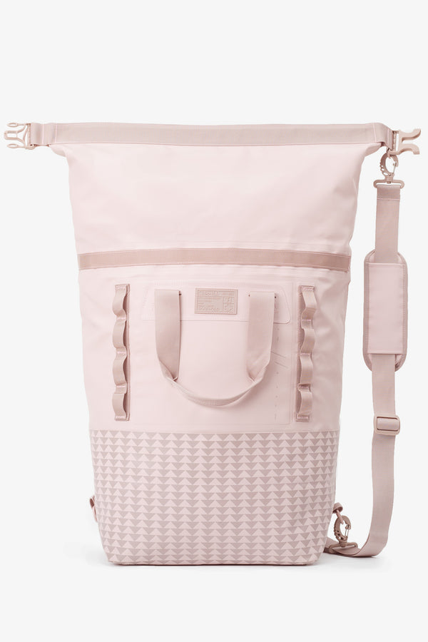 on the roam and so ill collaboration by jason momoa 45L medium pink bag on grey background