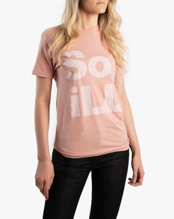 Female wearing Dirty Pink So iLL Stacked Logo tee